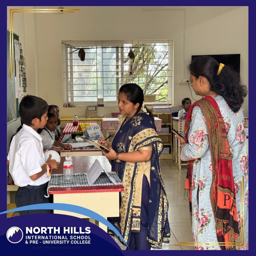 Teacher guiding student project
