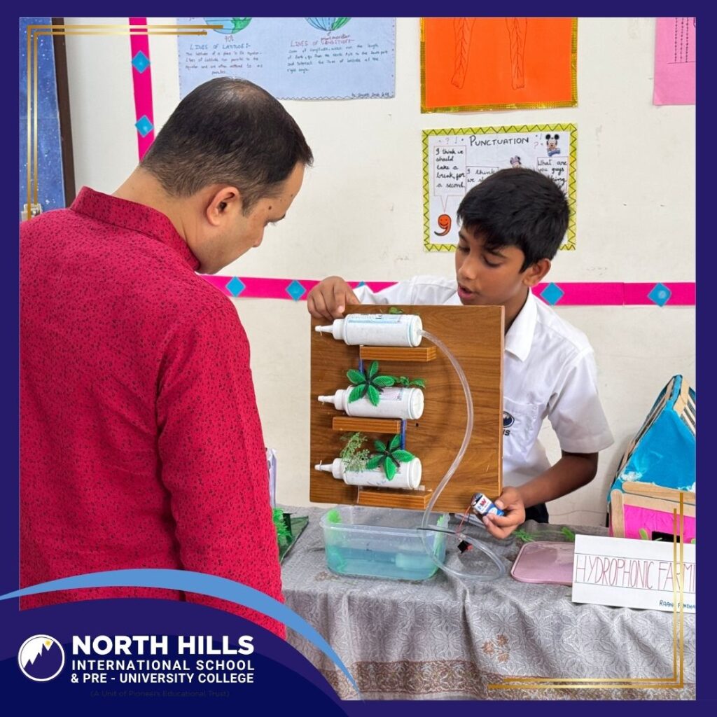 Student explaining working model