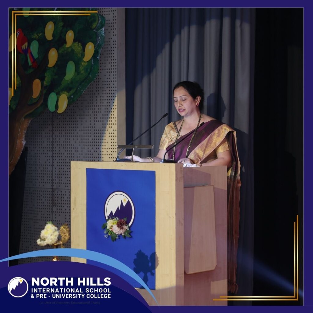School principal speech on stage