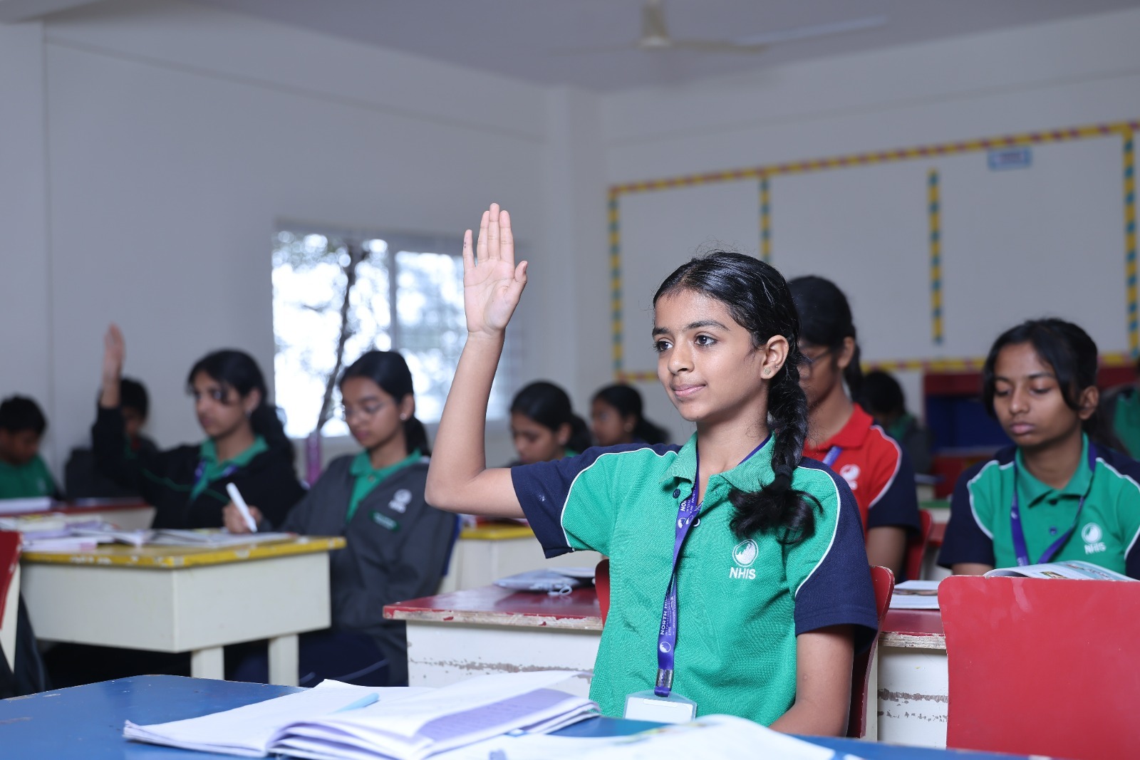 NHIS student answering in class