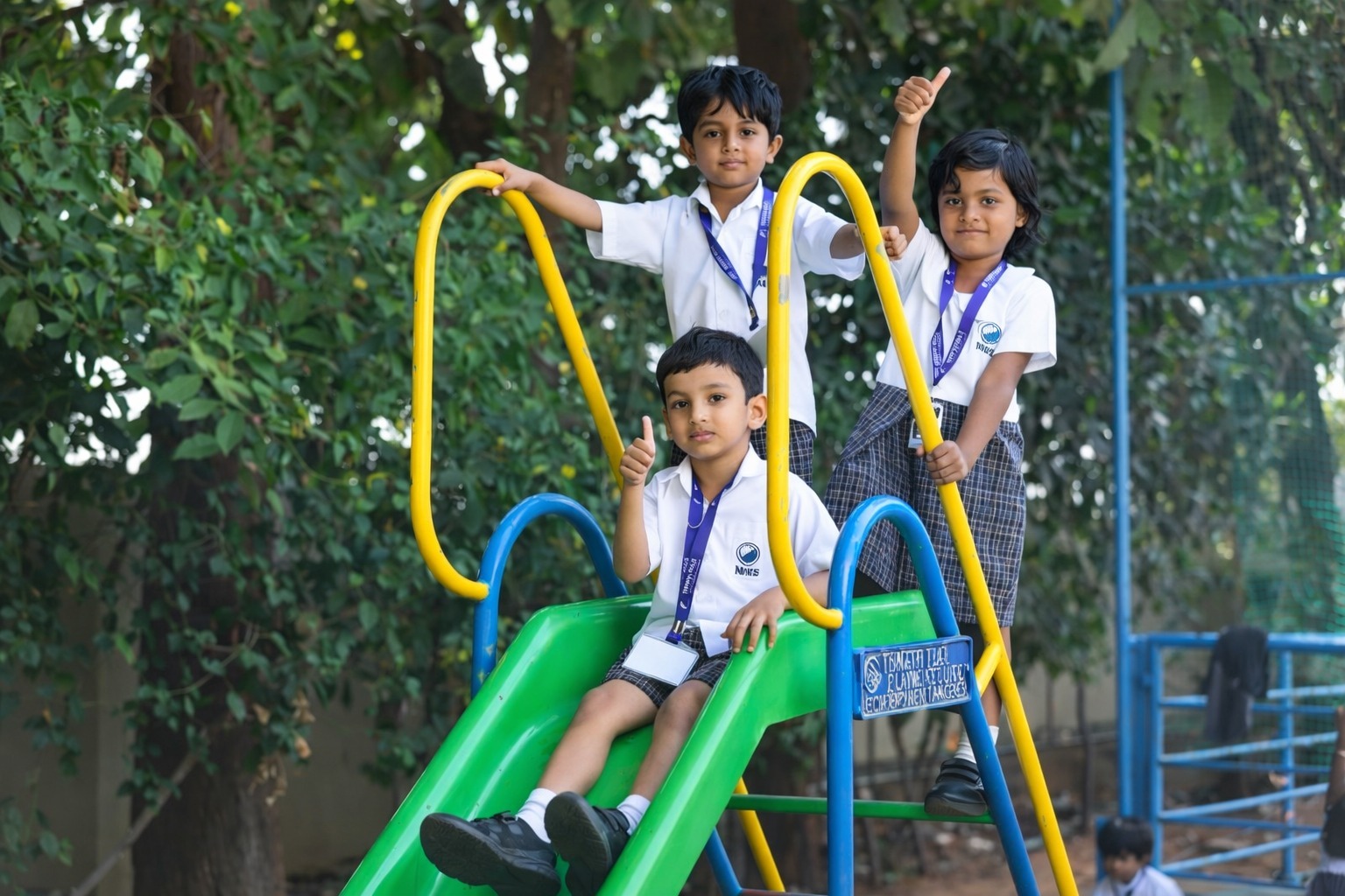 Children playing on school slide